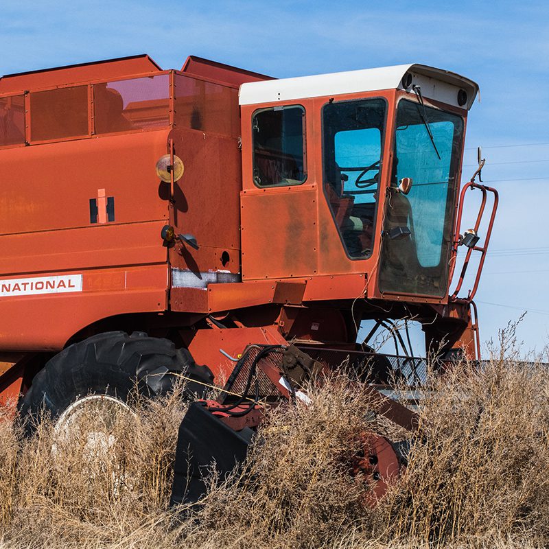 combin tractor clearing field