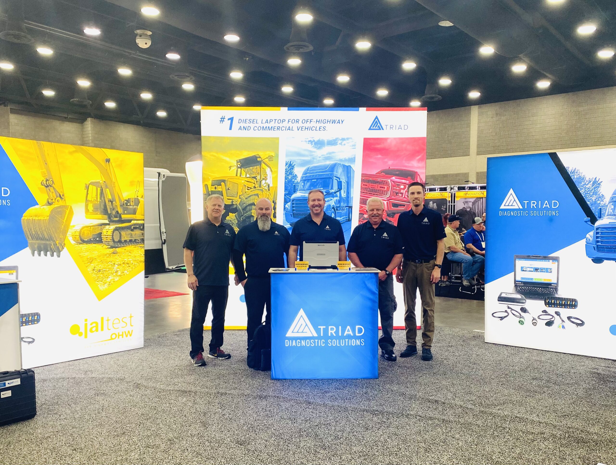 Triad team at tradeshow