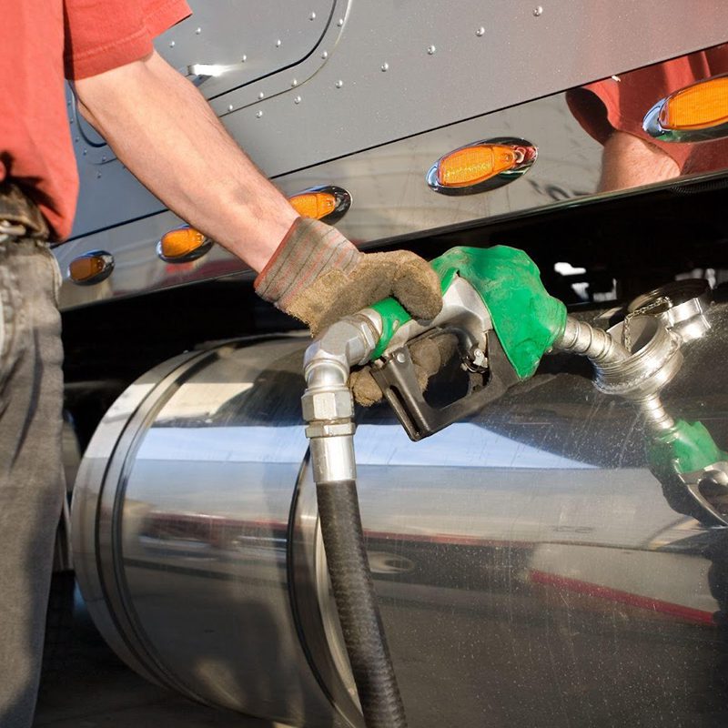 trucker filling up gas tanks