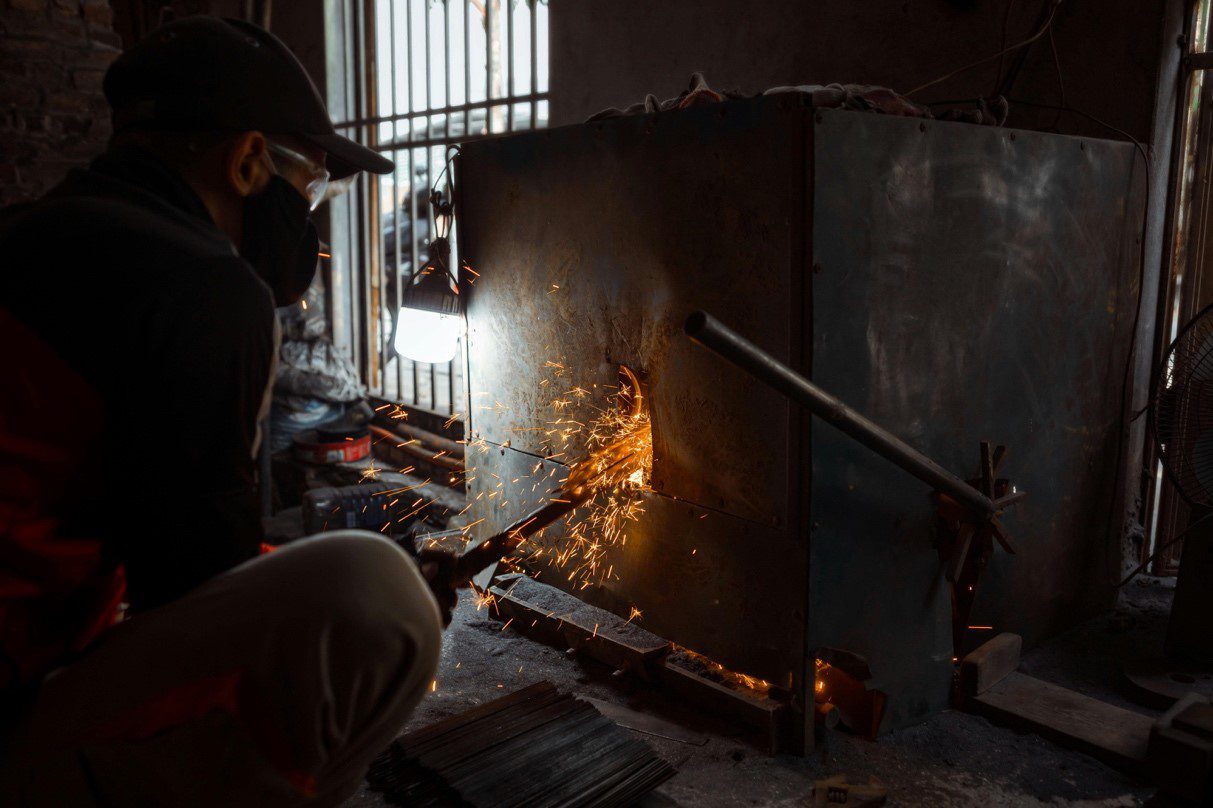 welder melting iron